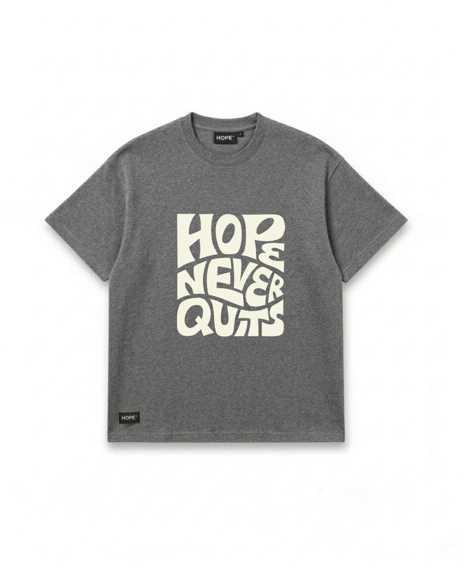 HOPE “Hope Never Quits” Oversized T-Shirt – Premium Cotton | Minimal Typography Design